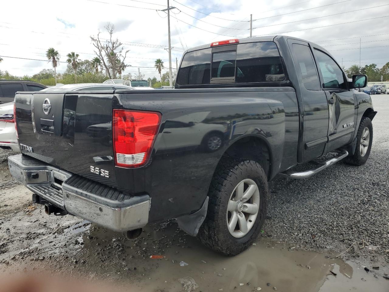 2009 Nissan Titan VIN 1N6BA06C09N317801 Copart auction photo, front end / side damage thumbnail 3