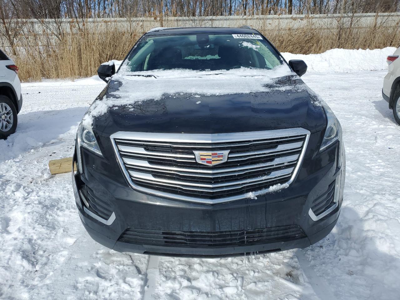 2018 Cadillac XT5 VIN 1GYKNDRS9JZ160715 Copart auction photo, side / front end damage thumbnail 5