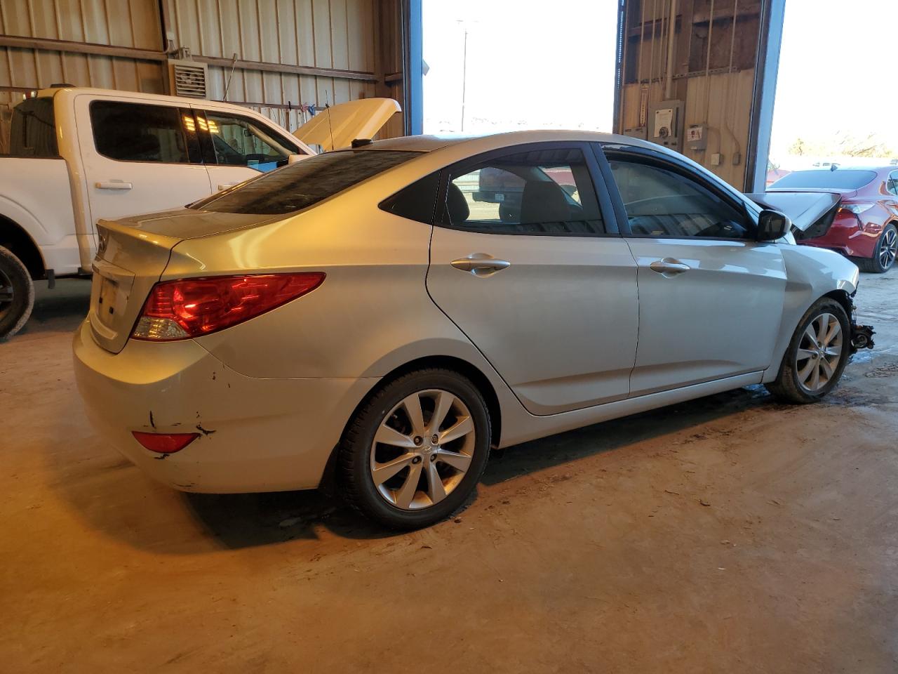 2014 Hyundai Accent VIN KMHCU4AE0EU762064 Copart auction photo, front end / hail damage thumbnail 3