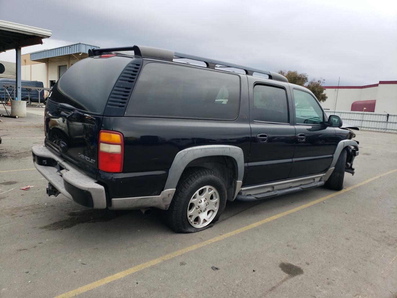2001 Chevrolet Suburban VIN 3GNFK16T91G237196 Copart auction photo, front end damage thumbnail 3