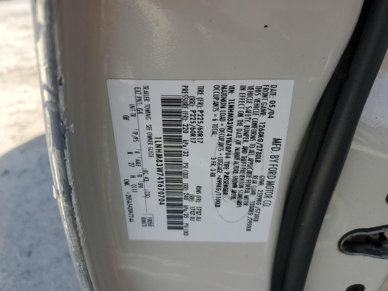 2004 Lincoln Town Car VIN 1LNHM83W74Y670704 Copart auction photo, front end / side damage thumbnail 12