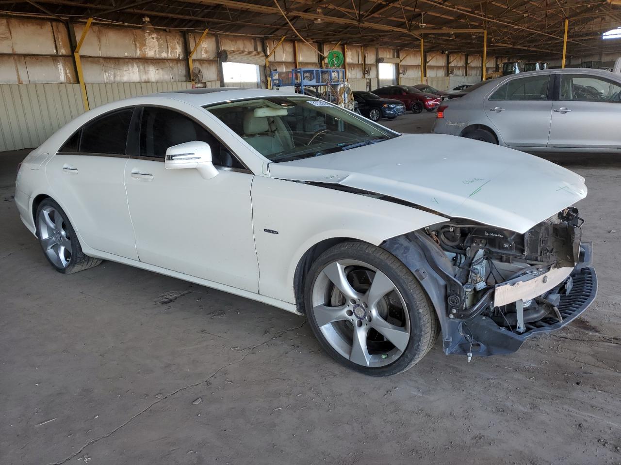 2012 Mercedes-Benz Cls-klasse VIN WDDLJ7DB3CA018303 Copart auction photo, front end / top/roof damage thumbnail 4