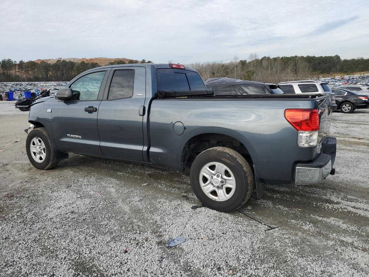2010 Toyota Tundra VIN 5TFRM5F11AX009551 Copart auction photo, front end damage thumbnail 2