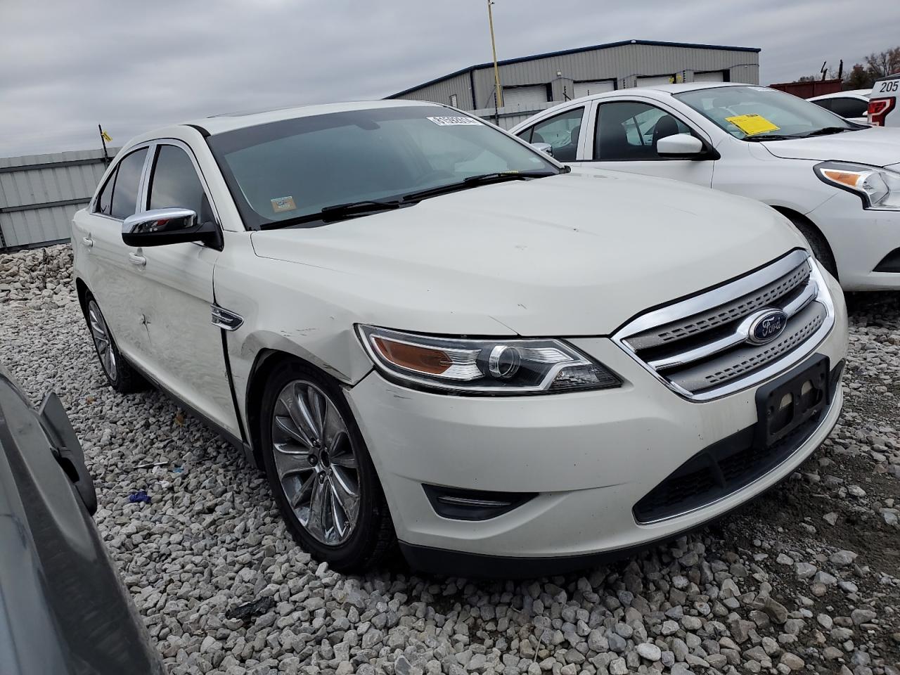2010 Ford Taurus VIN 1FAHP2FW6AG160632 Copart auction photo, side damage thumbnail 4