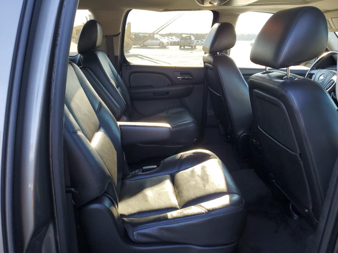 2012 Chevrolet Suburban VIN 1GNSCKE04CR218311 Copart auction photo, top/roof damage thumbnail 11