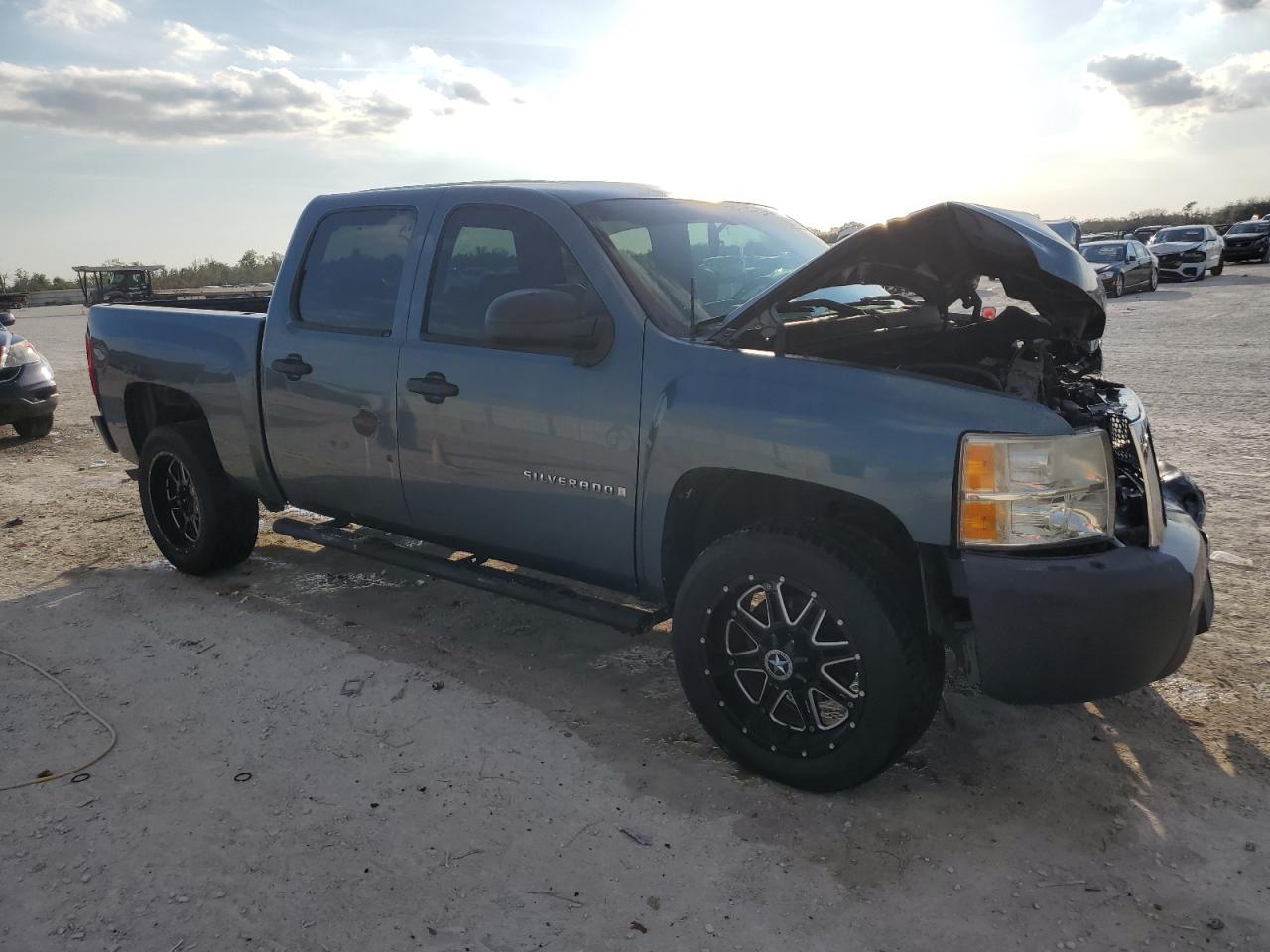 2009 Chevrolet Silverado VIN 3GCEC13049G204260 Copart auction photo, front end damage thumbnail 4
