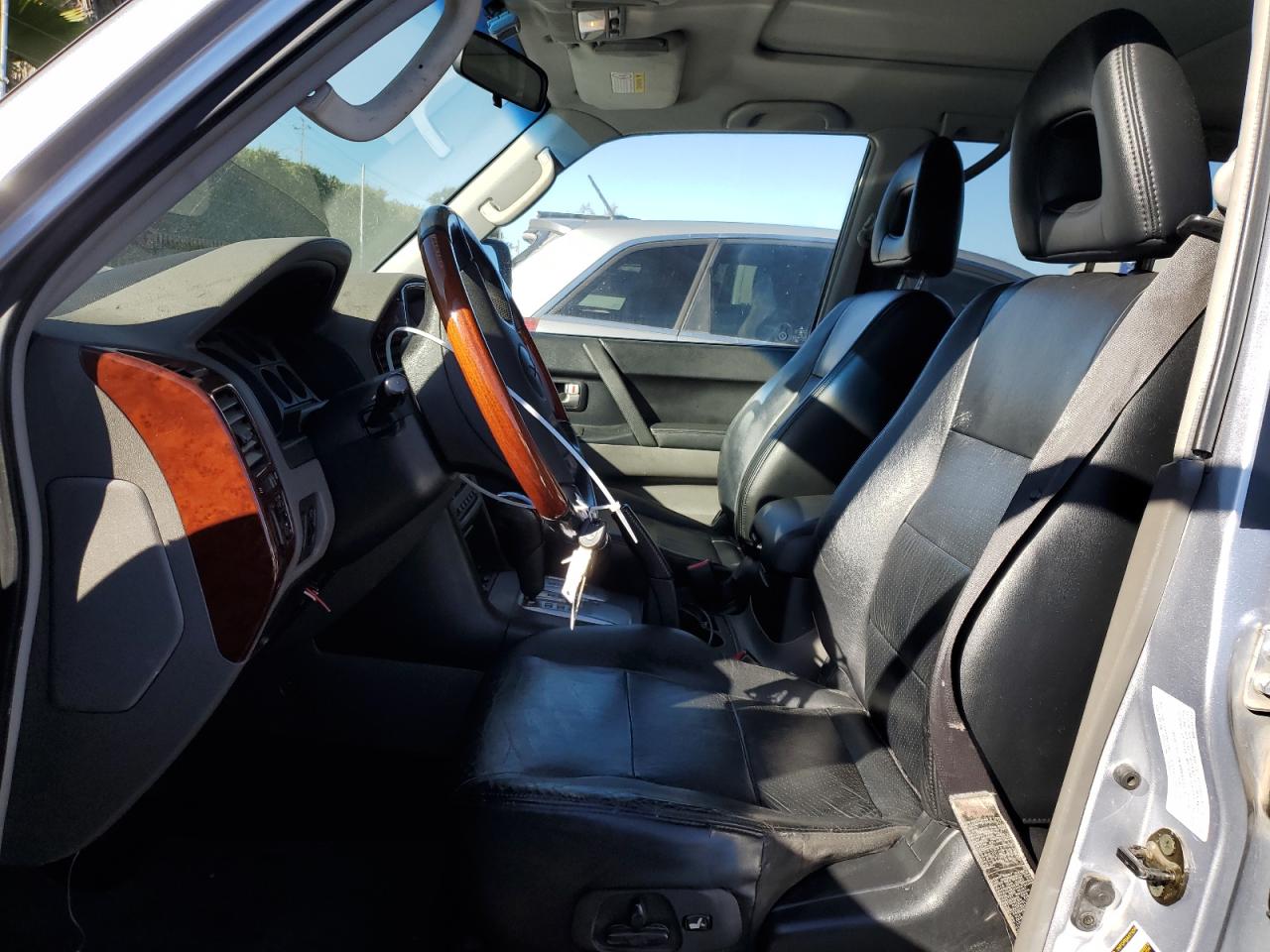 2004 Mitsubishi Montero VIN JA4MW51S74J010242 Copart auction photo, front end / side damage thumbnail 7