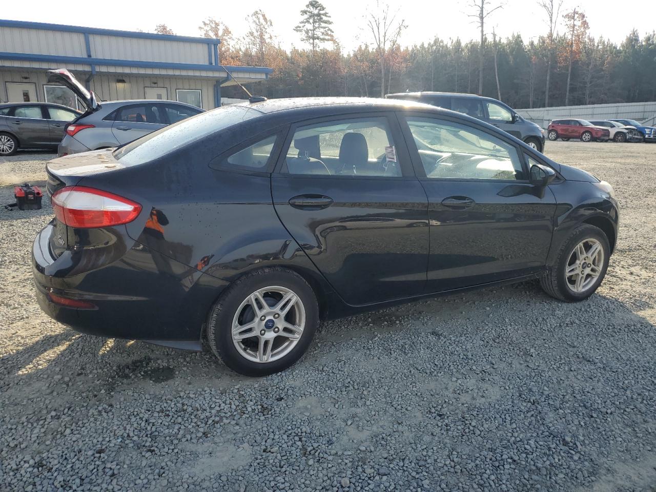 2018 Ford Fiesta VIN 3FADP4BJ6JM147521 Copart auction photo, all over damage thumbnail 3