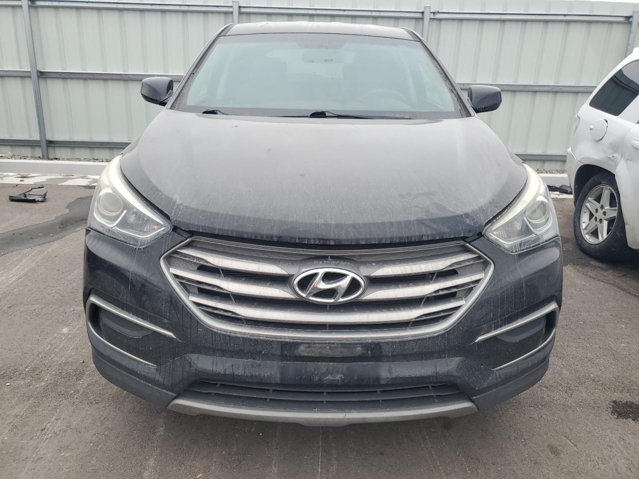 2017 Hyundai Santa Fe VIN 5NMZT3LB4HH022057 Copart auction photo, rear end damage thumbnail 5