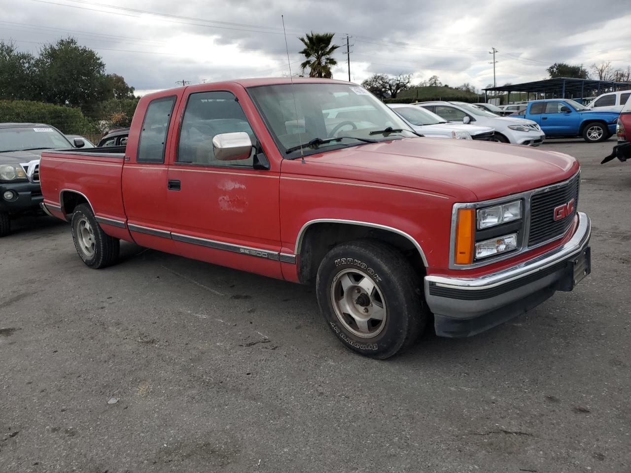 1991 GMC Sierra VIN 2GTEC19K8M1519850 Copart auction photo, rear end damage thumbnail 4