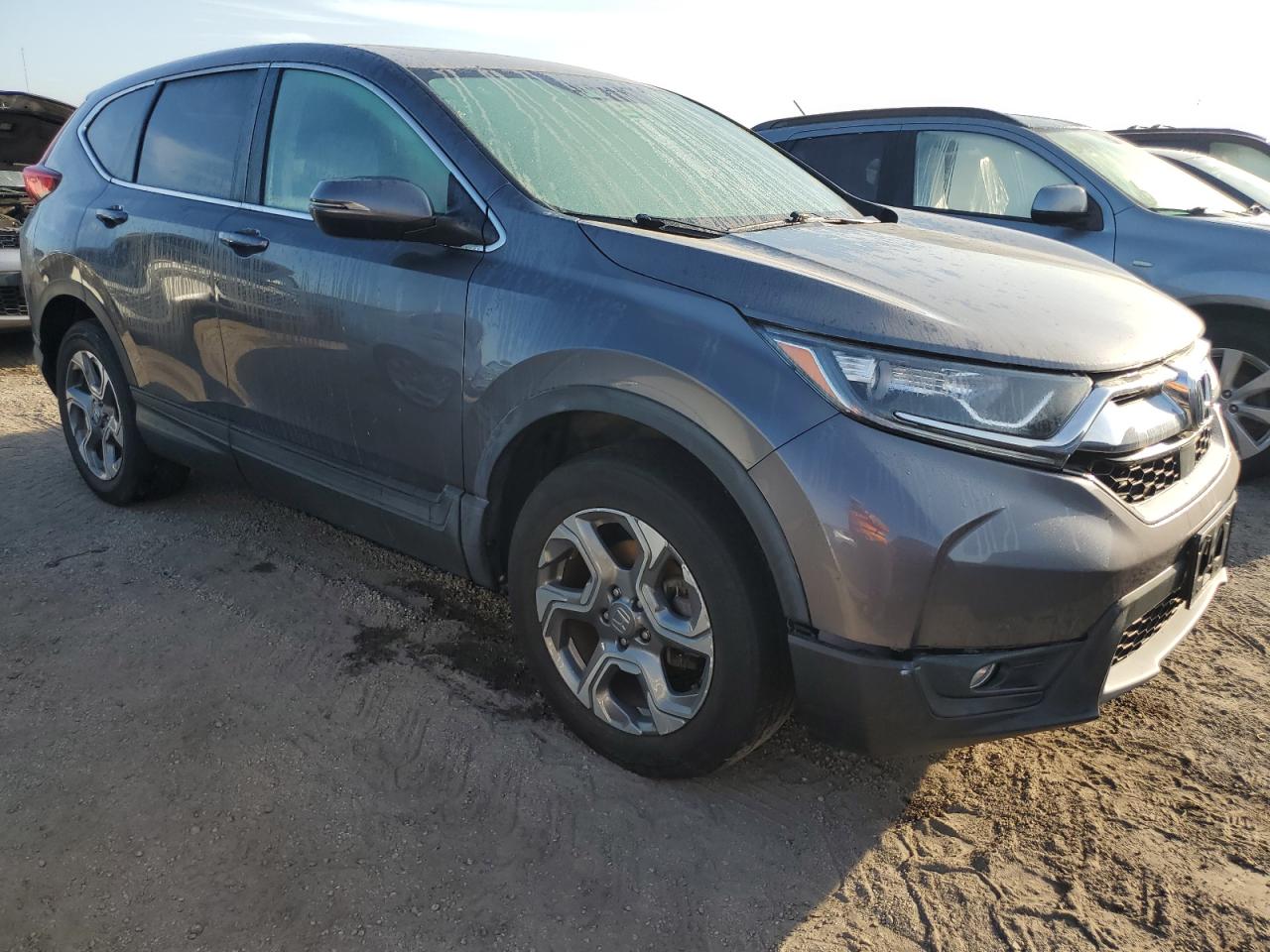 2019 Honda CR-V VIN 2HKRW2H83KH653133 Copart auction photo, water/flood damage thumbnail 4