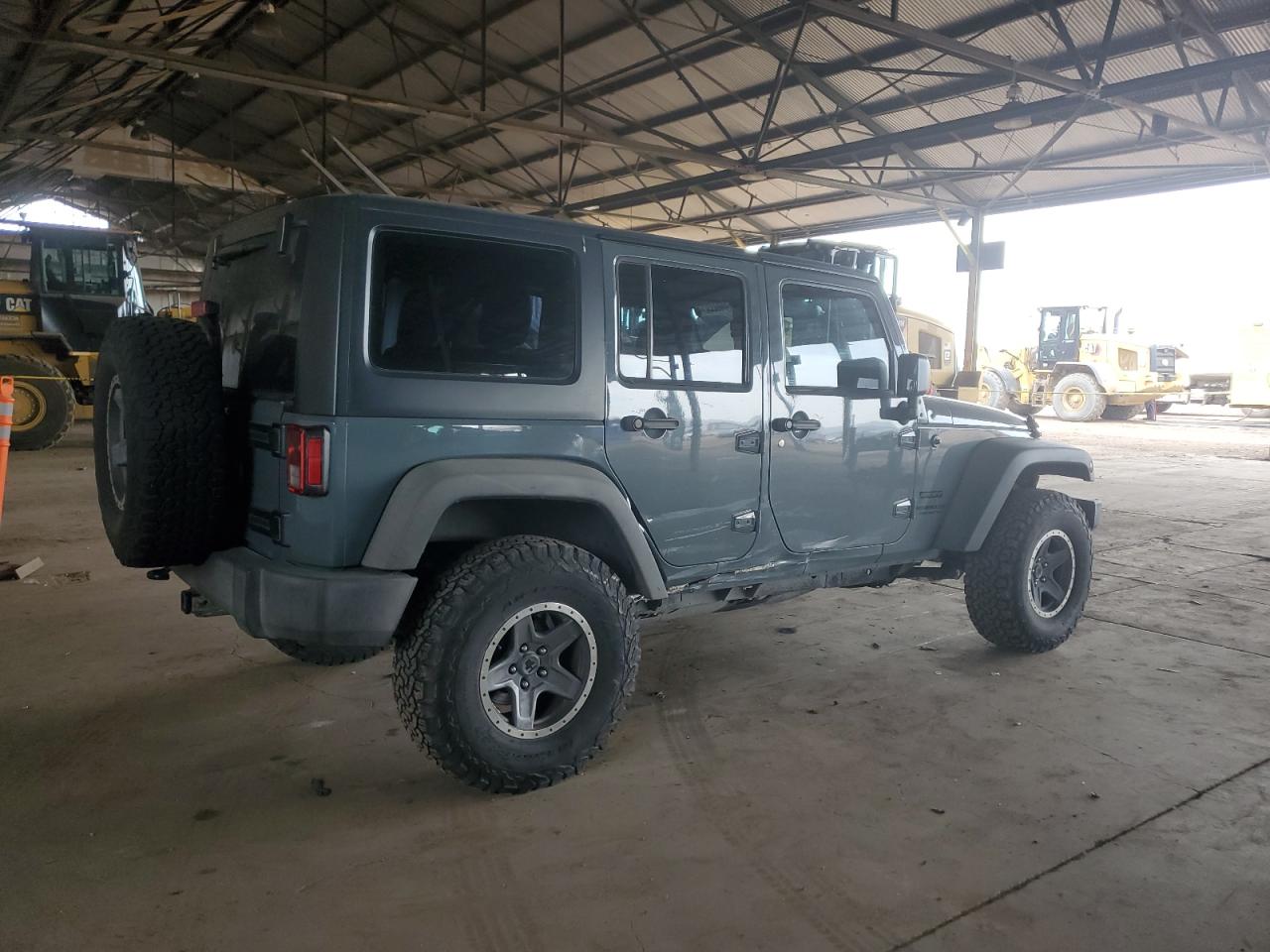 2015 Jeep Wrangler VIN 1C4BJWDG5FL693042 Copart auction photo, side damage thumbnail 3