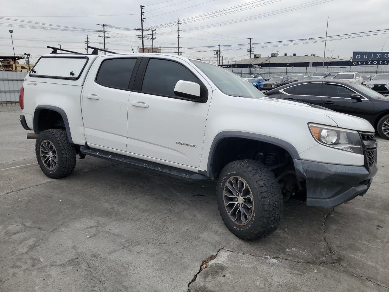 2018 Chevrolet Colorado VIN 1GCPTEE1XJ1105919 Copart auction photo, all over damage thumbnail 4