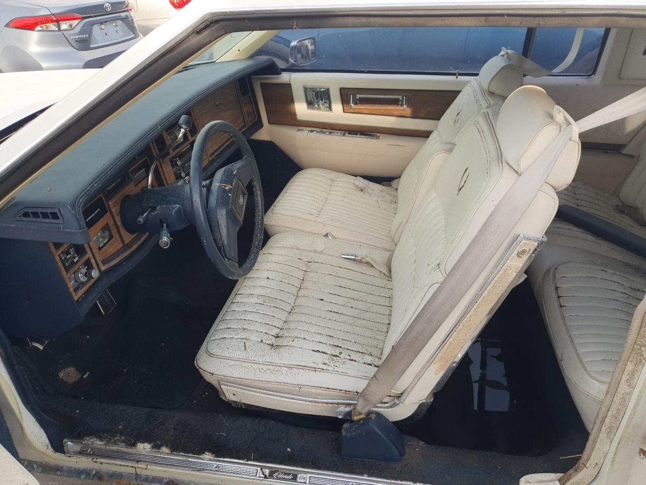 1985 Cadillac Eldorado VIN 1G6EL5782FE630140 Copart auction photo, water/flood damage thumbnail 7