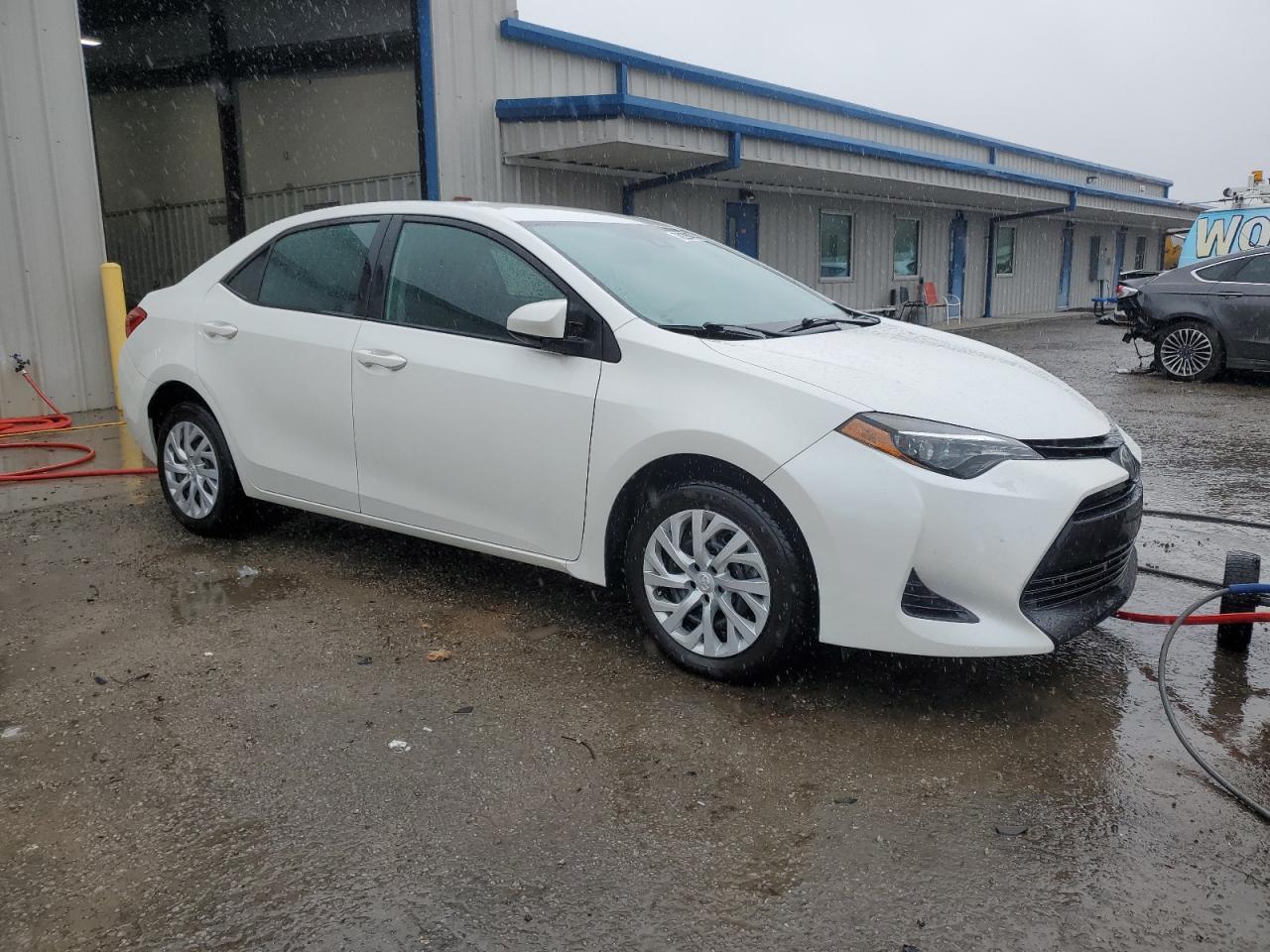 2018 Toyota Corolla VIN 5YFBURHE1JP847490 Copart auction photo, front end damage thumbnail 4