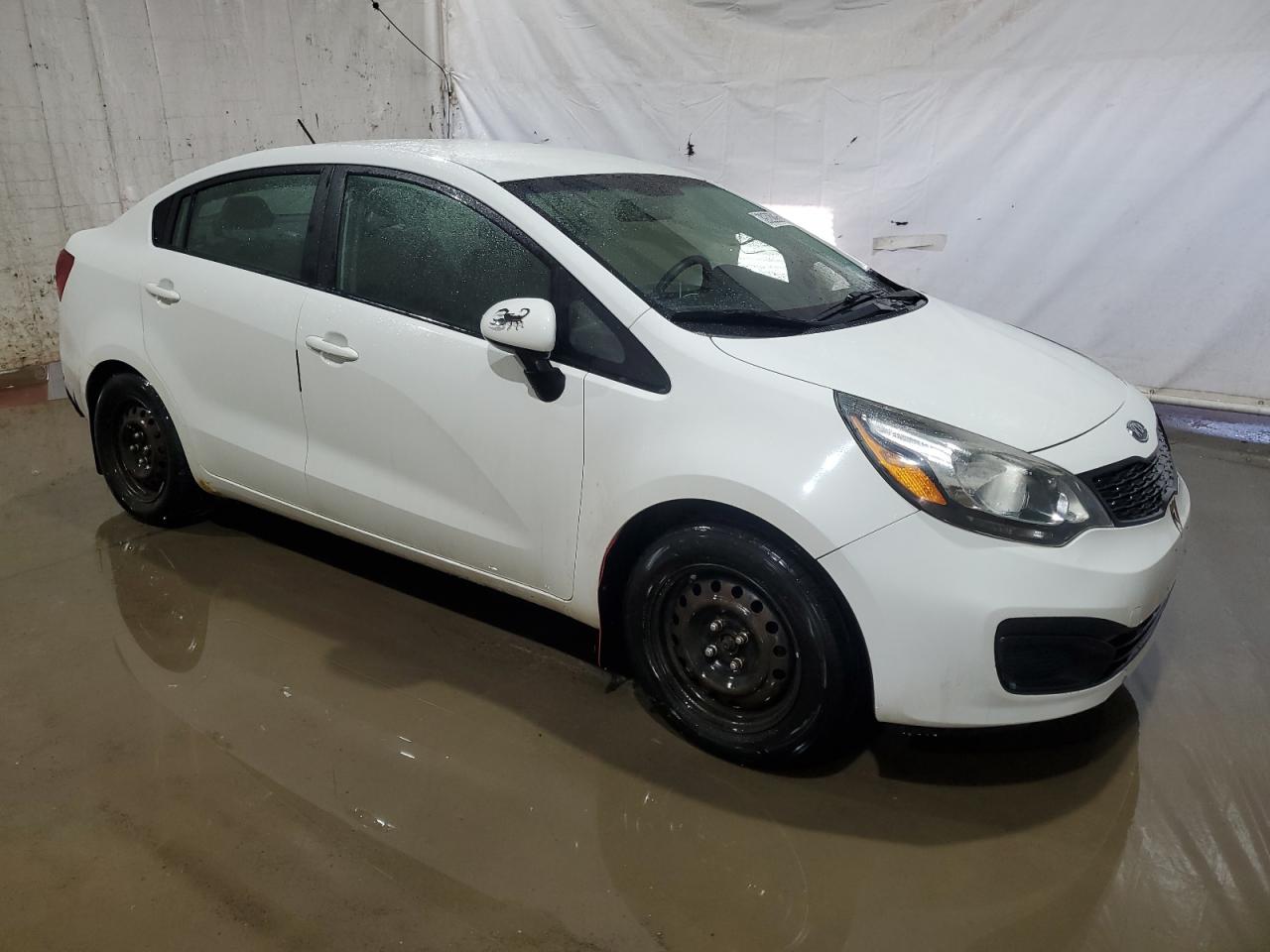 2012 KIA Rio VIN KNADM4A3XC6074319 Copart auction photo, side / rear end damage thumbnail 4