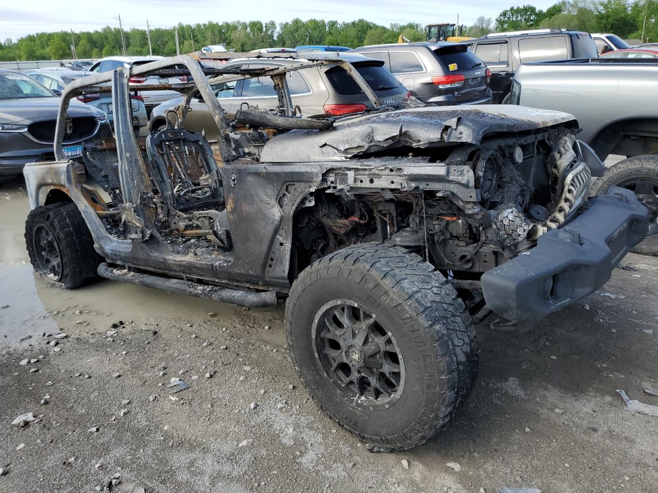 2020 Jeep Wrangler VIN 1C4HJXDN1LW182081 Copart auction photo, burn damage thumbnail 4
