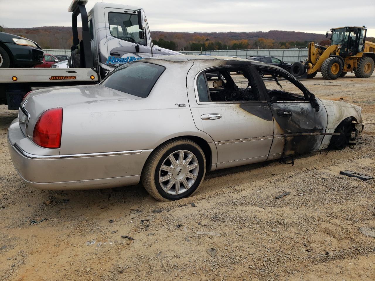 2010 Lincoln Town Car VIN 2LNBL8CV8AX621328 Copart auction photo, burn damage thumbnail 3