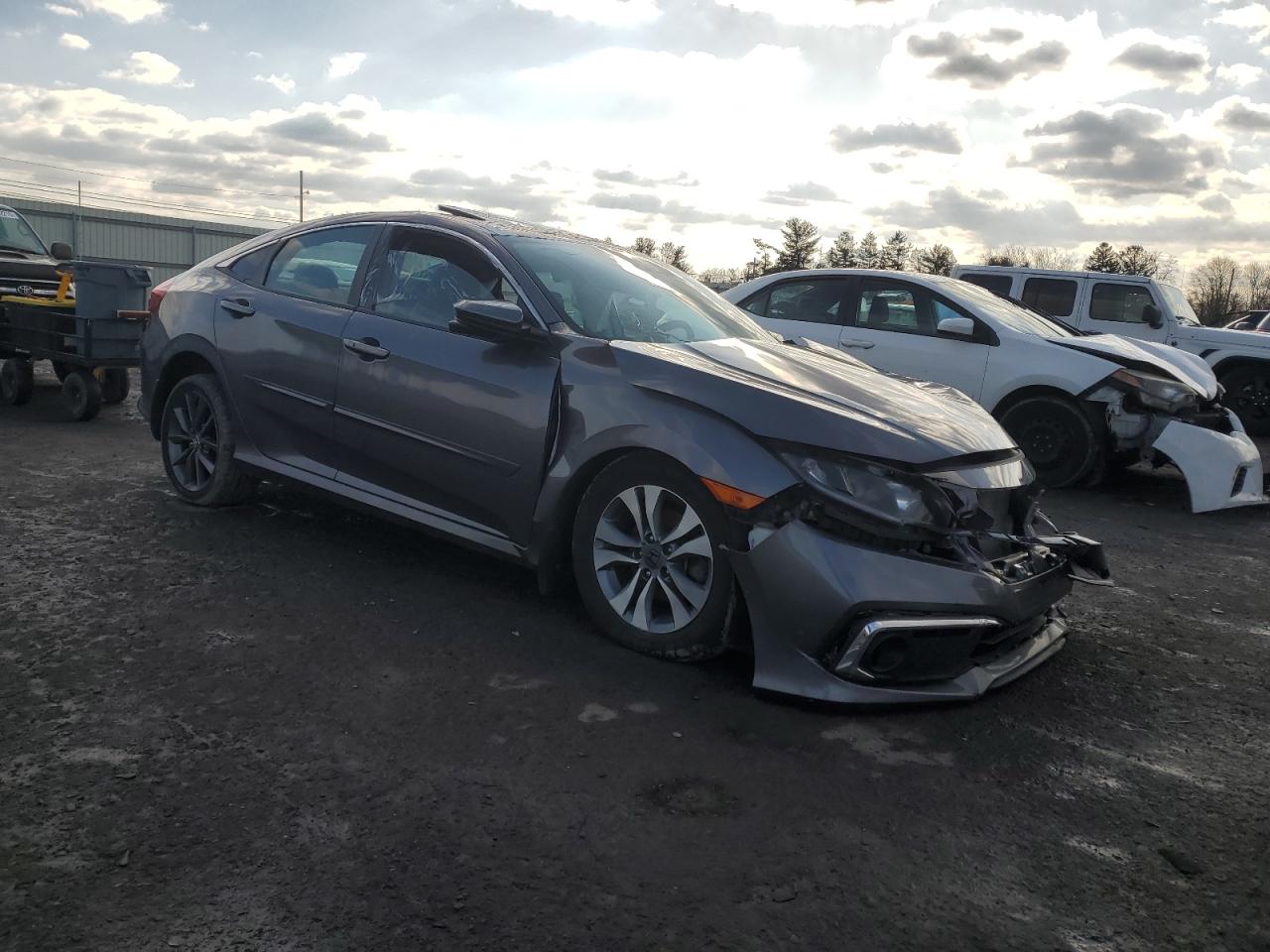 2020 Honda Civic VIN 19XFC1F76LE010037 Copart auction photo, front end / top/roof damage thumbnail 4