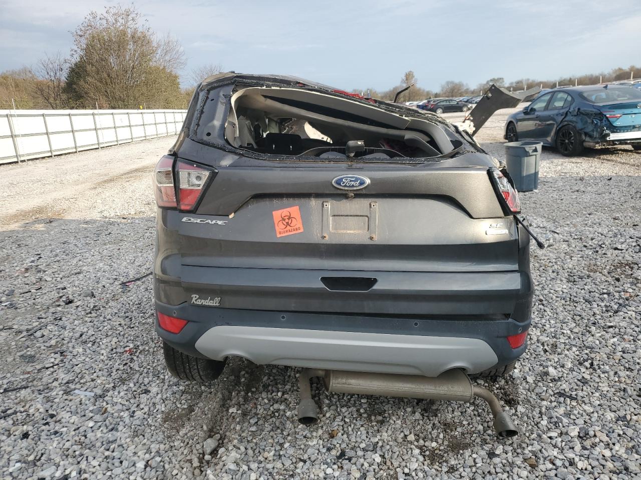 2017 Ford Escape VIN 1FMCU0GD0HUB66058 Copart auction photo, rollover / all over damage thumbnail 6