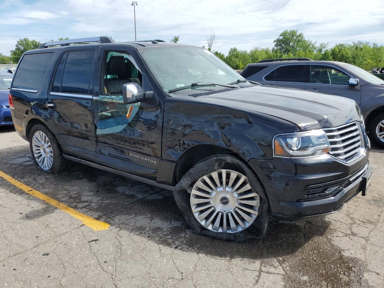 2016 Lincoln Navigator VIN 5LMJJ2LT1GEL06701 Copart auction photo, all over damage thumbnail 4