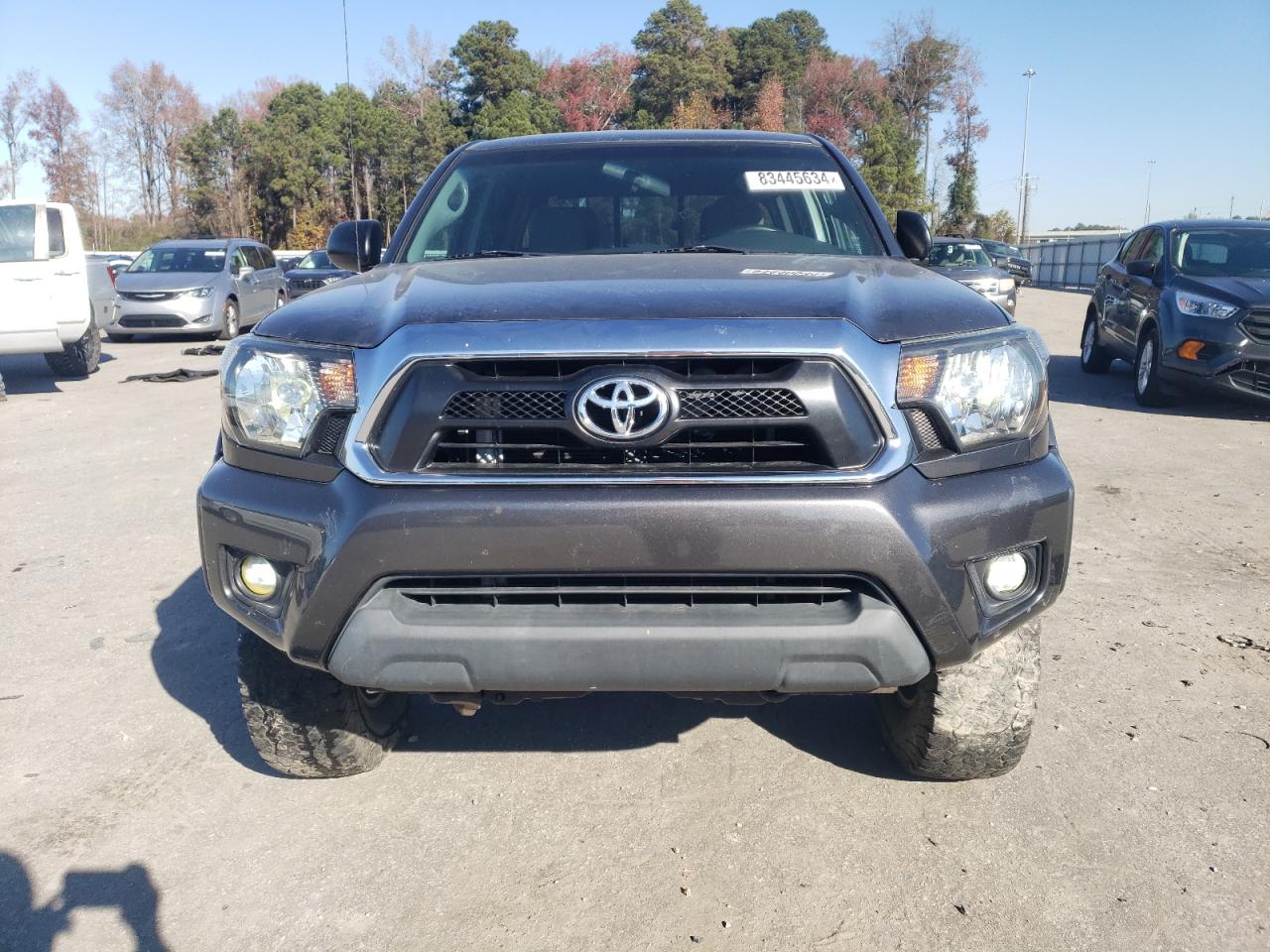 2014 Toyota Tacoma VIN 5TFLU4EN9EX093807 Copart auction photo, side damage thumbnail 5