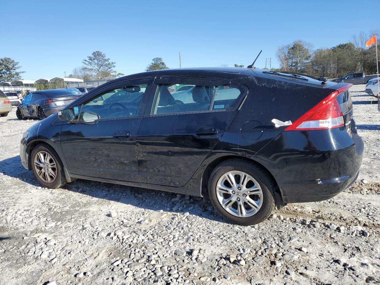 2010 Honda Insight VIN JHMZE2H78AS021172 Copart auction photo, rear end damage thumbnail 2