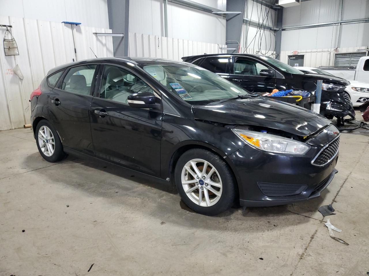 2015 Ford Focus VIN 1FADP3K23FL220601 Copart auction photo, front end damage thumbnail 4