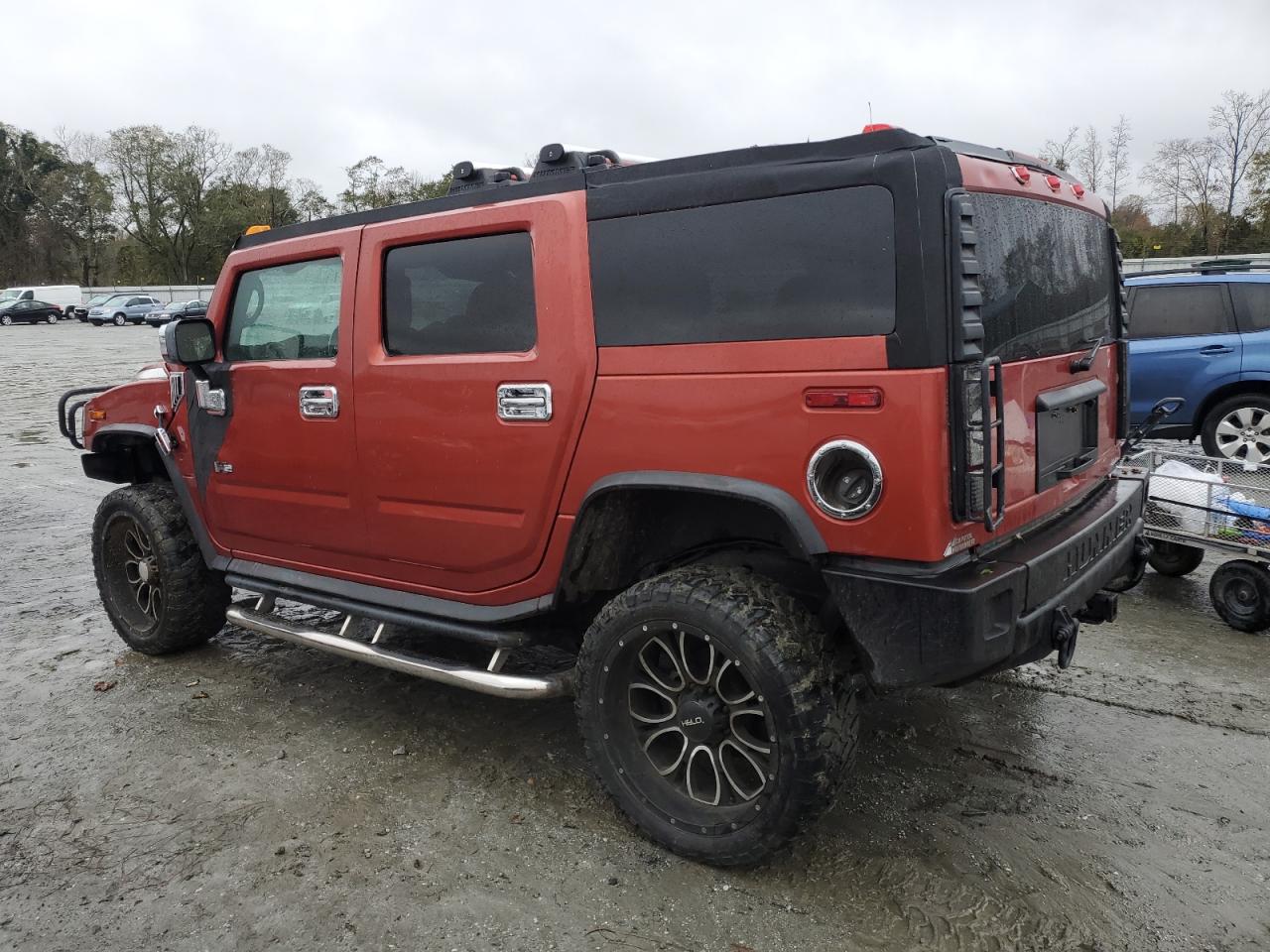 2003 Hummer H2 VIN 5GRGN23U33H136931 Copart auction photo, top/roof damage thumbnail 2