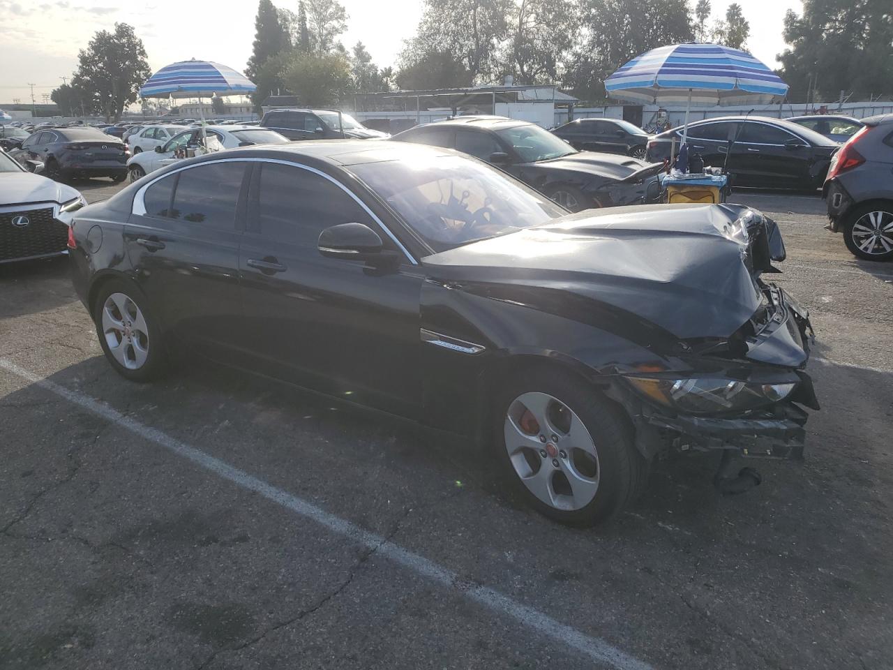 2017 Jaguar XE VIN SAJAR4BG6HA973242 Copart auction photo, side / front end damage thumbnail 4