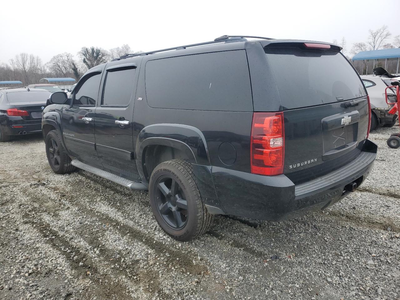 2009 Chevrolet Suburban VIN 1GNFK26339R234196 Copart auction photo, front end damage thumbnail 2