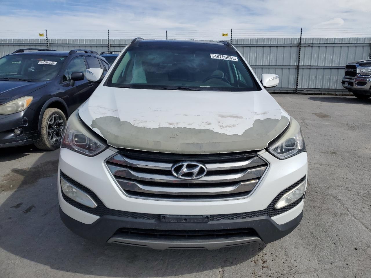 2015 Hyundai Santa Fe VIN 5XYZUDLB3FG267362 Copart auction photo, front end damage thumbnail 5