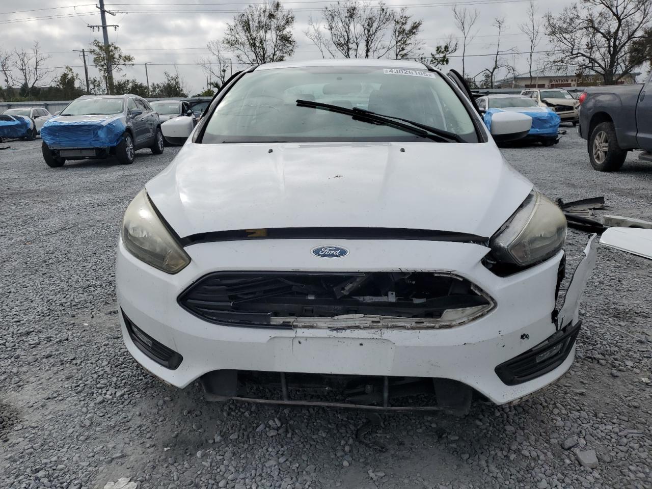 2018 Ford Focus VIN 1FADP3F29JL308300 Copart auction photo, water/flood / all over damage thumbnail 5