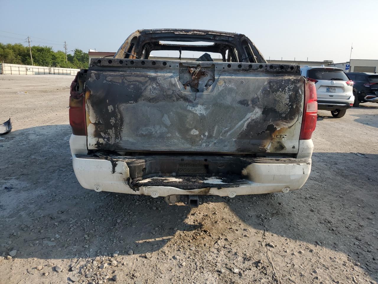 2012 Chevrolet Avalanche VIN 3GNTKGE71CG294537 Copart auction photo, burn damage thumbnail 6