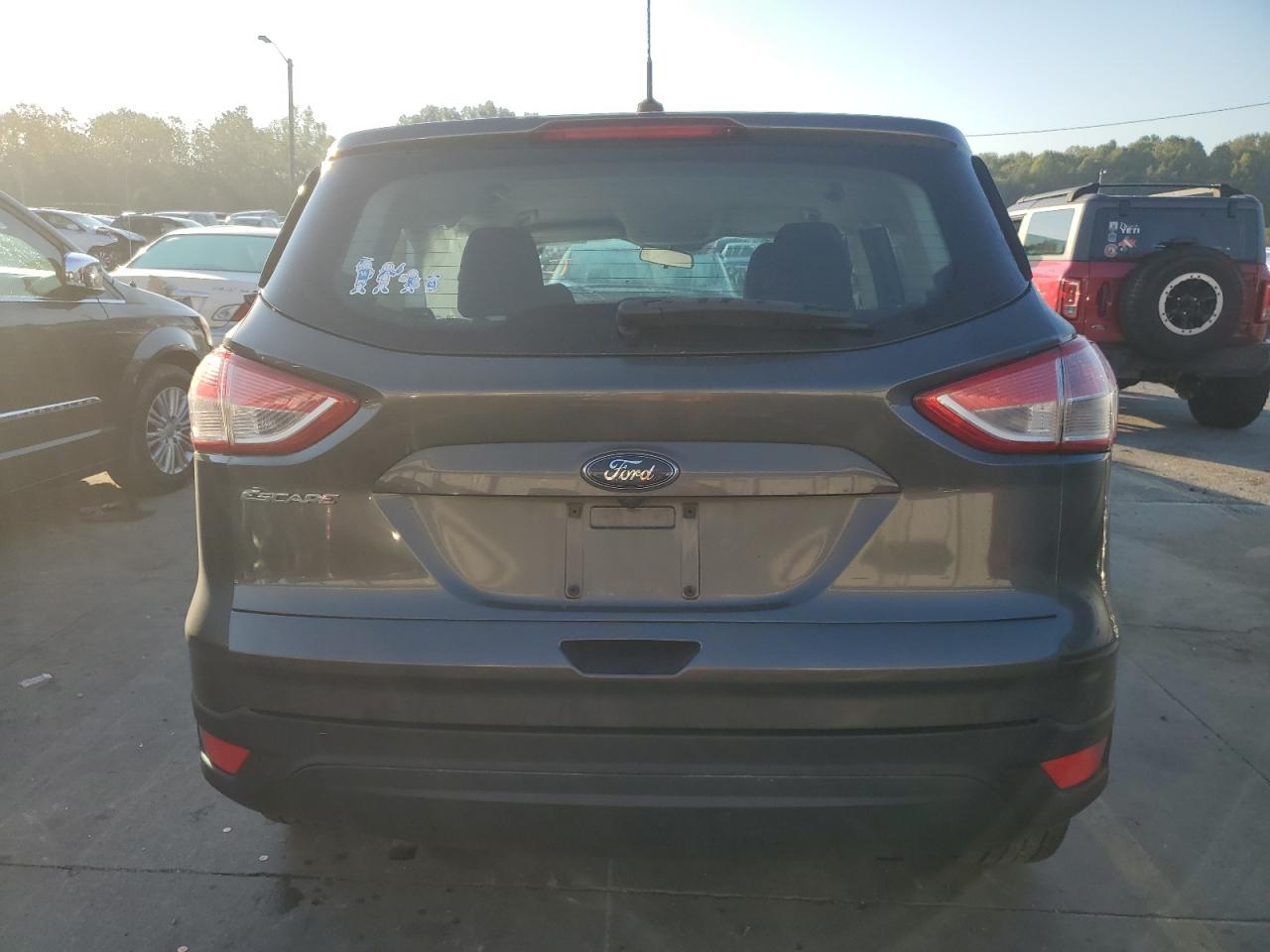 2015 Ford Escape VIN 1FMCU0F71FUC85696 Copart auction photo, side / all over damage thumbnail 6