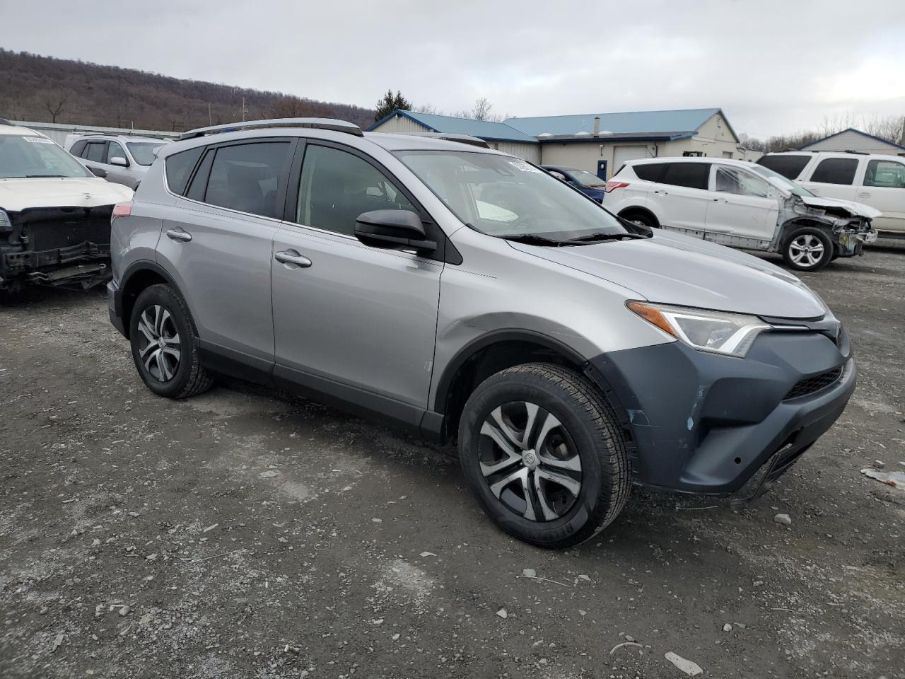 2018 Toyota RAV 4 VIN JTMBFREV7JJ215760 Copart auction photo, side / minor dent/scratches damage thumbnail 4