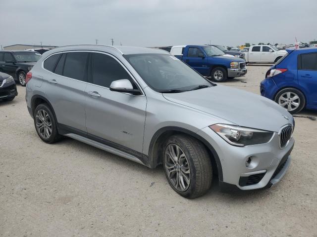 2017 BMW X1 VIN WBXHU7C32HP924791 Copart auction photo, all over / undercarriage damage thumbnail 4