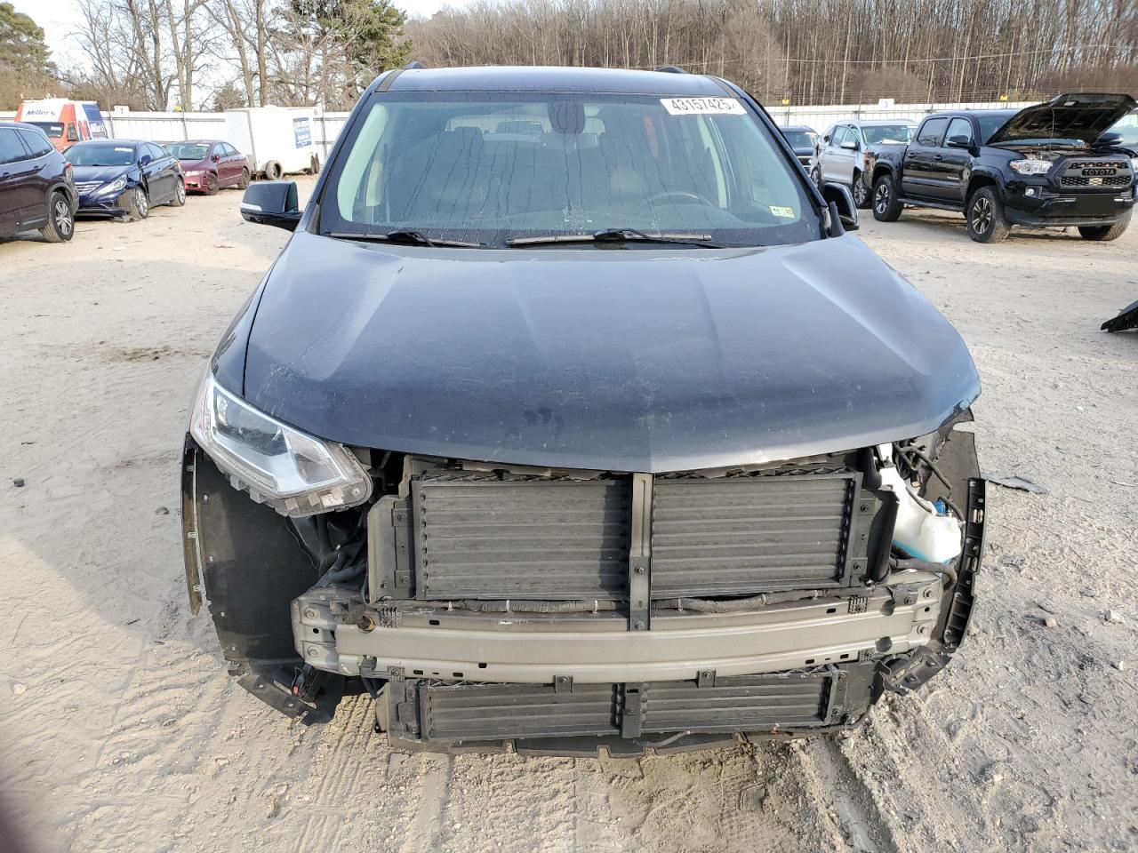 2019 Chevrolet Traverse VIN 1GNERJKX7KJ242574 Copart auction photo, side / front end damage thumbnail 5