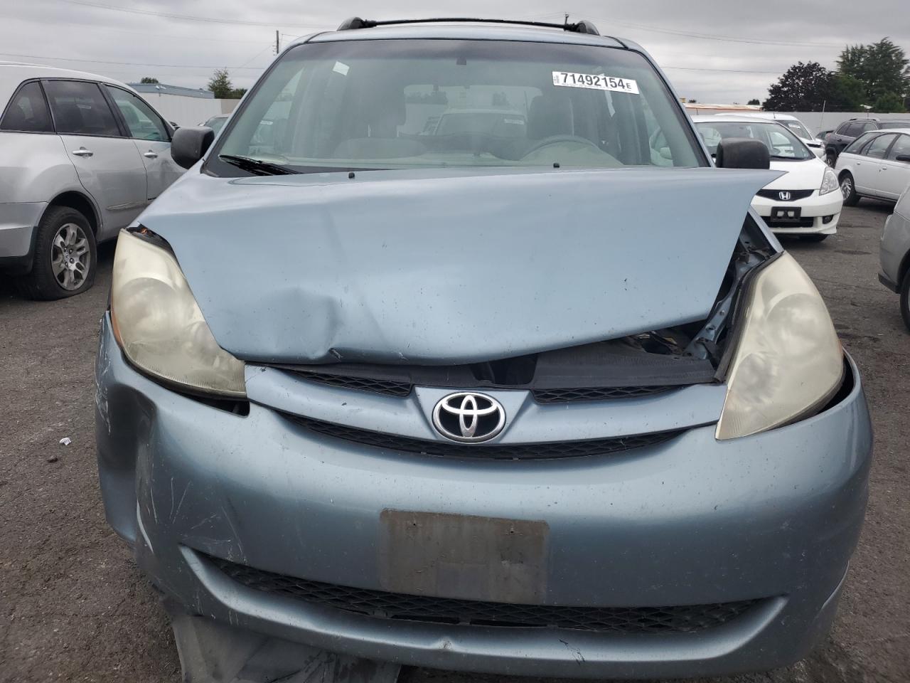 2009 Toyota Sienna VIN 5TDZK23C39S238549 Copart auction photo, front end / rear end damage thumbnail 5