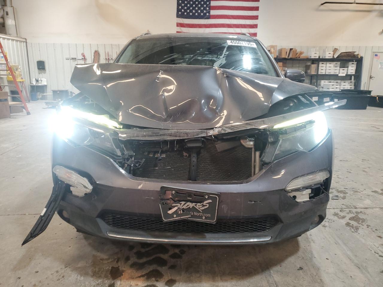 2016 Honda Pilot VIN 5FNYF5H96GB027619 Copart auction photo, front end / minor dent/scratches damage thumbnail 5
