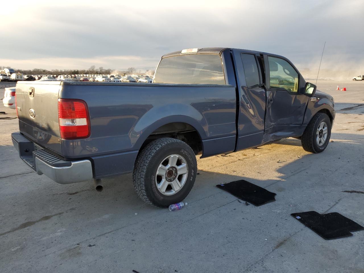 2004 Ford F-150 VIN 1FTRX12W14NC45585 Copart auction photo, side damage thumbnail 3