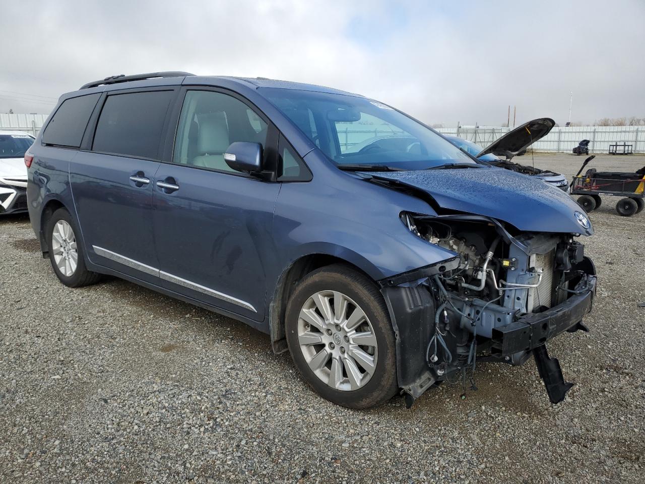 2015 Toyota Sienna VIN 5TDYK3DC1FS629808 Copart auction photo, front end damage thumbnail 4