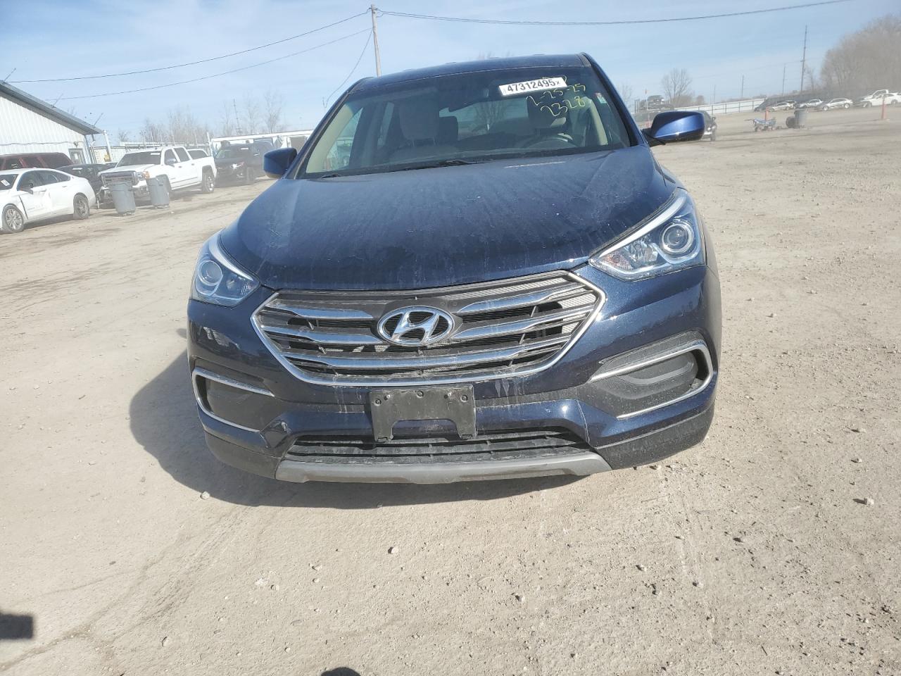 2018 Hyundai Santa Fe VIN 5XYZTDLB5JG562328 Copart auction photo, side damage thumbnail 5