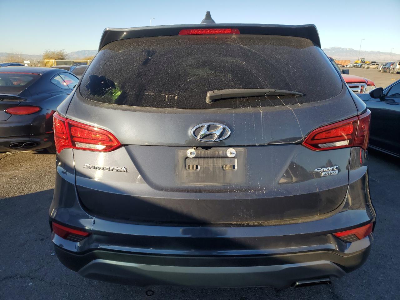 2017 Hyundai Santa Fe VIN 5NMZTDLB9HH002067 Copart auction photo, front end damage thumbnail 6