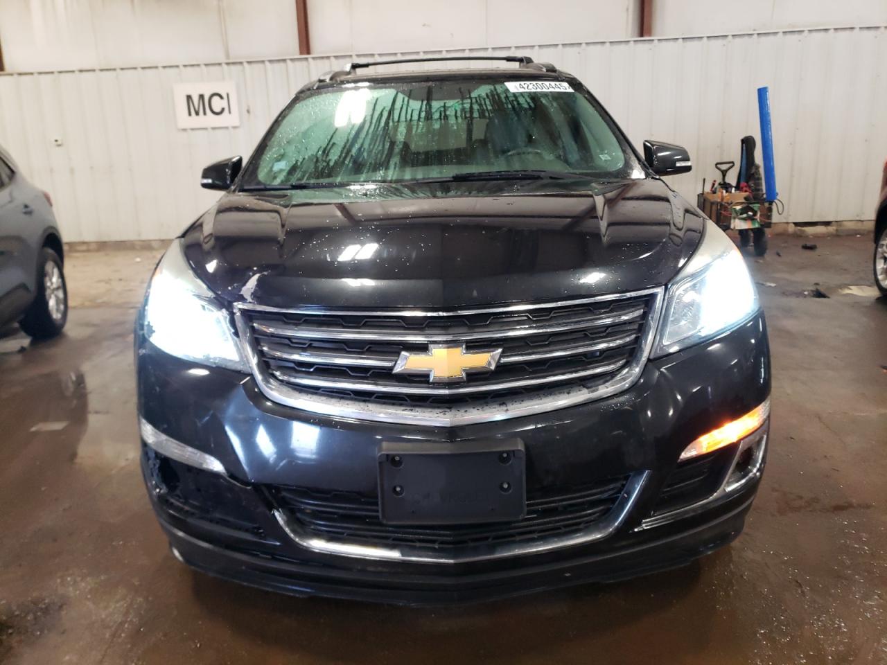 2015 Chevrolet Traverse VIN 1GNKVHKDXFJ214660 Copart auction photo, front end / side damage thumbnail 5