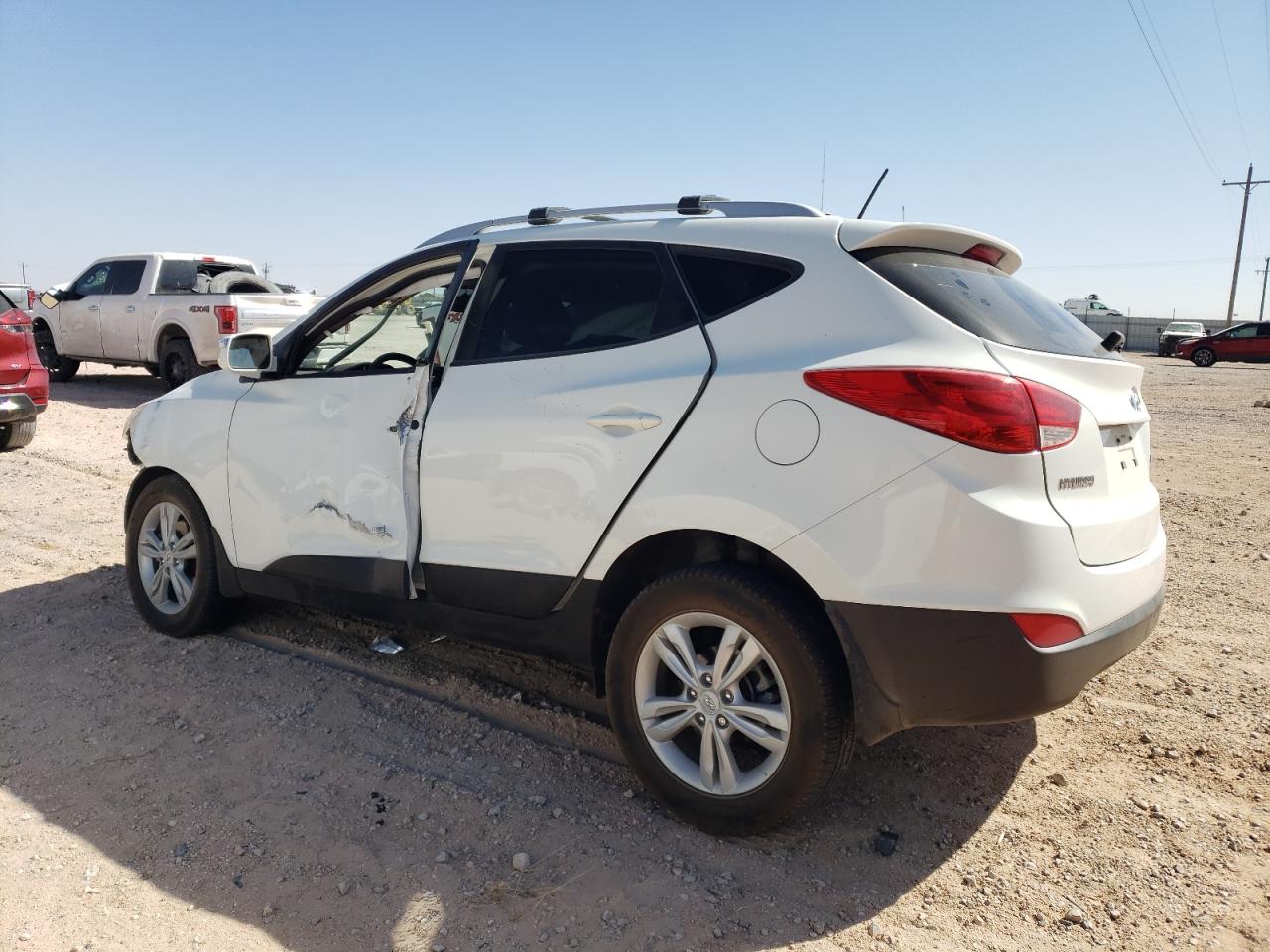 2012 Hyundai Tucson VIN KM8JU3AC8CU480929 Copart auction photo, front end / side damage thumbnail 2