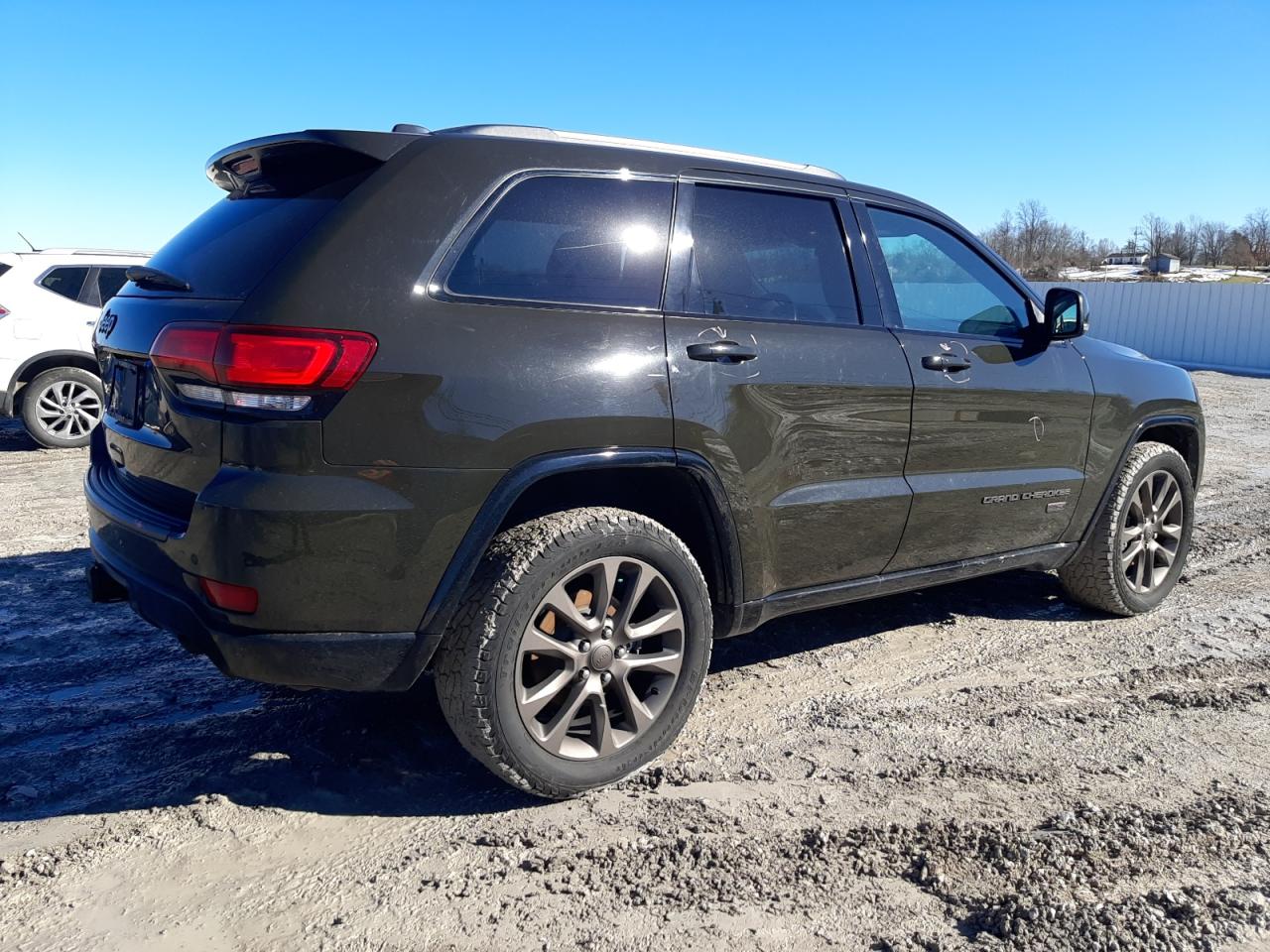 2016 Jeep Grand Cherokee VIN 1C4RJFBGXGC427356 Copart auction photo, side damage thumbnail 3