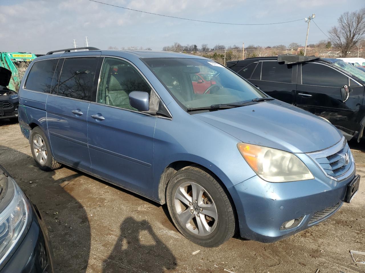 2010 Honda Odyssey VIN 5FNRL3H90AB043579 Copart auction photo, rear end / side damage thumbnail 4