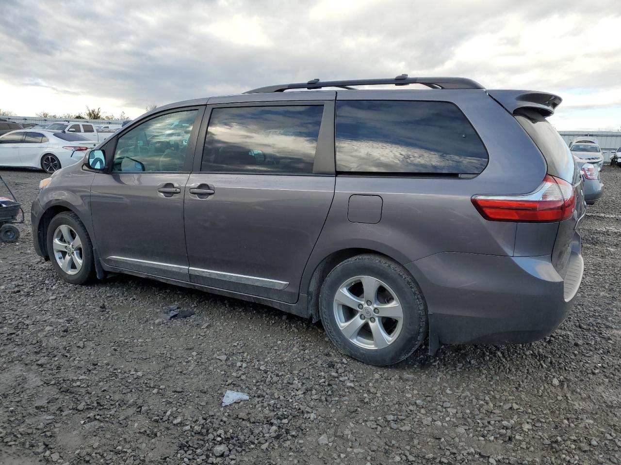 2015 Toyota Sienna VIN 5TDKK3DC9FS634454 Copart auction photo, side / rear end damage thumbnail 2
