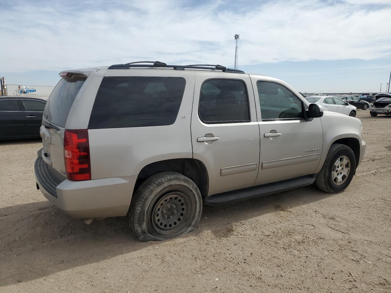 2009 Chevrolet Tahoe VIN 1GNFK230X9R170832 Copart auction photo, side / minor dent/scratches damage thumbnail 3
